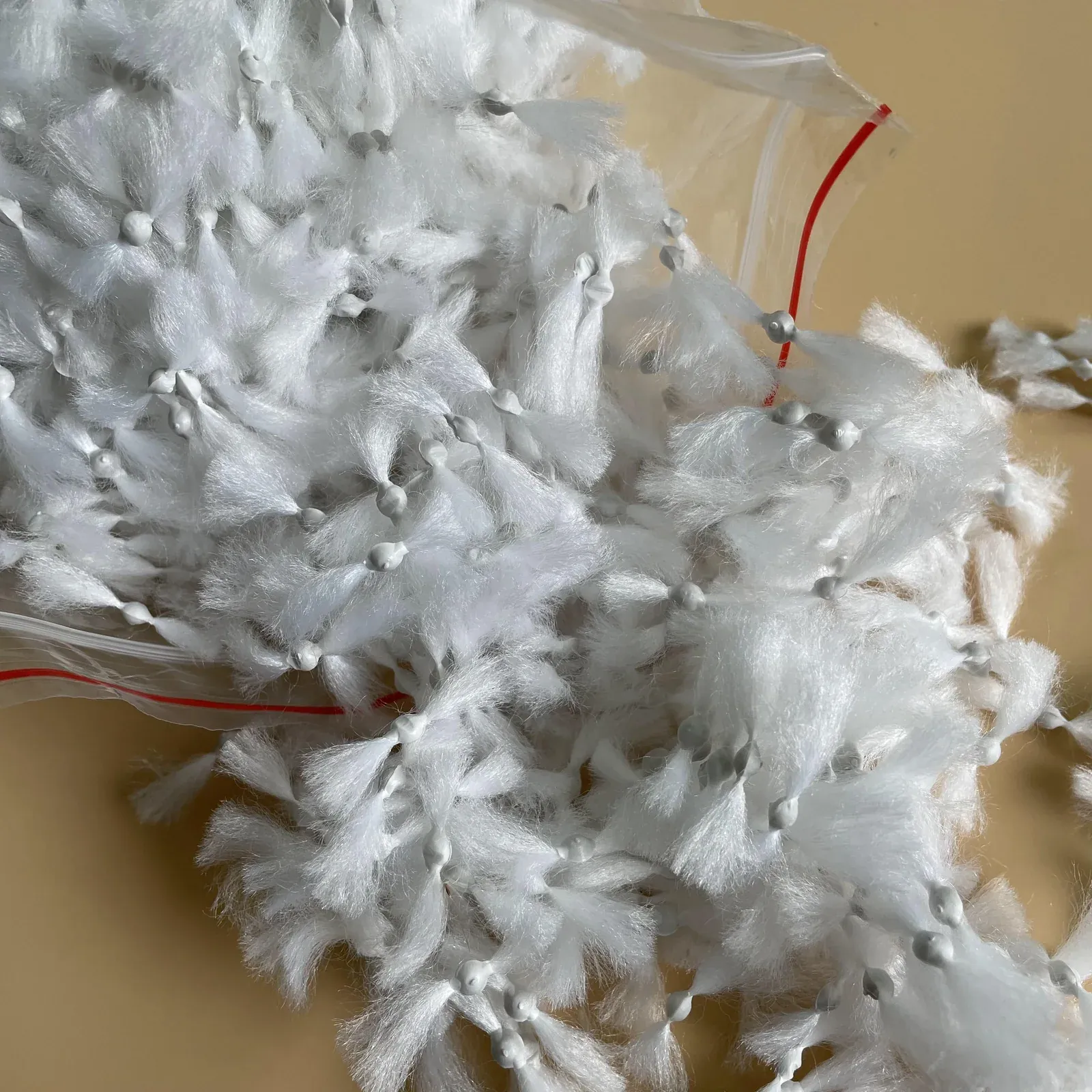 Comet-shaped fiber filter media product photograph 1
