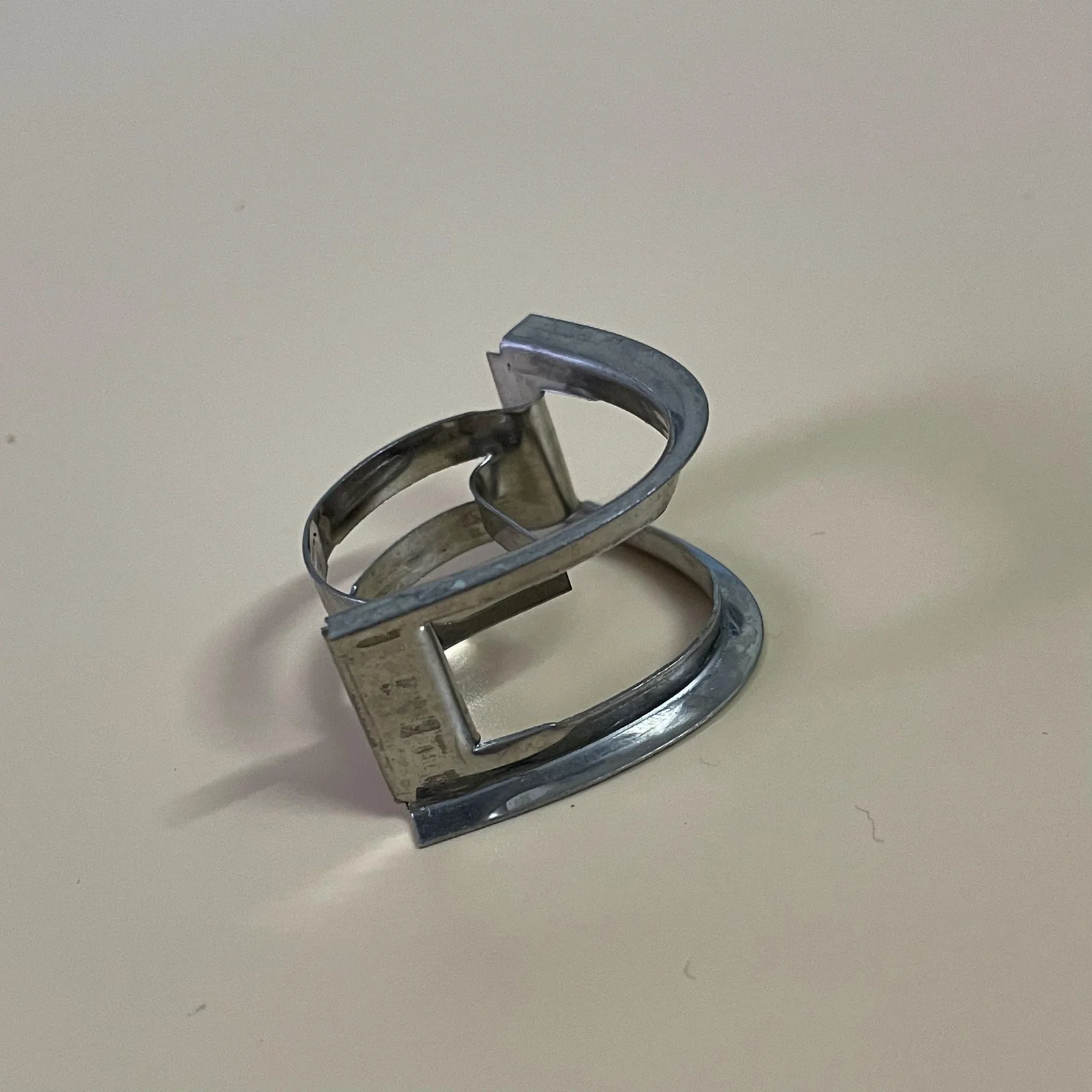 Metal Intalox saddle ring product photograph 1